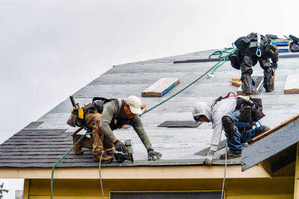Professional Gutter Installation technician working in Log Lane Village, CO